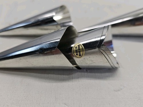 Pair of silver cone-shaped Fox Run cream horn molds with metal tips, engraved with “MADE IN U.S.A.” on side.