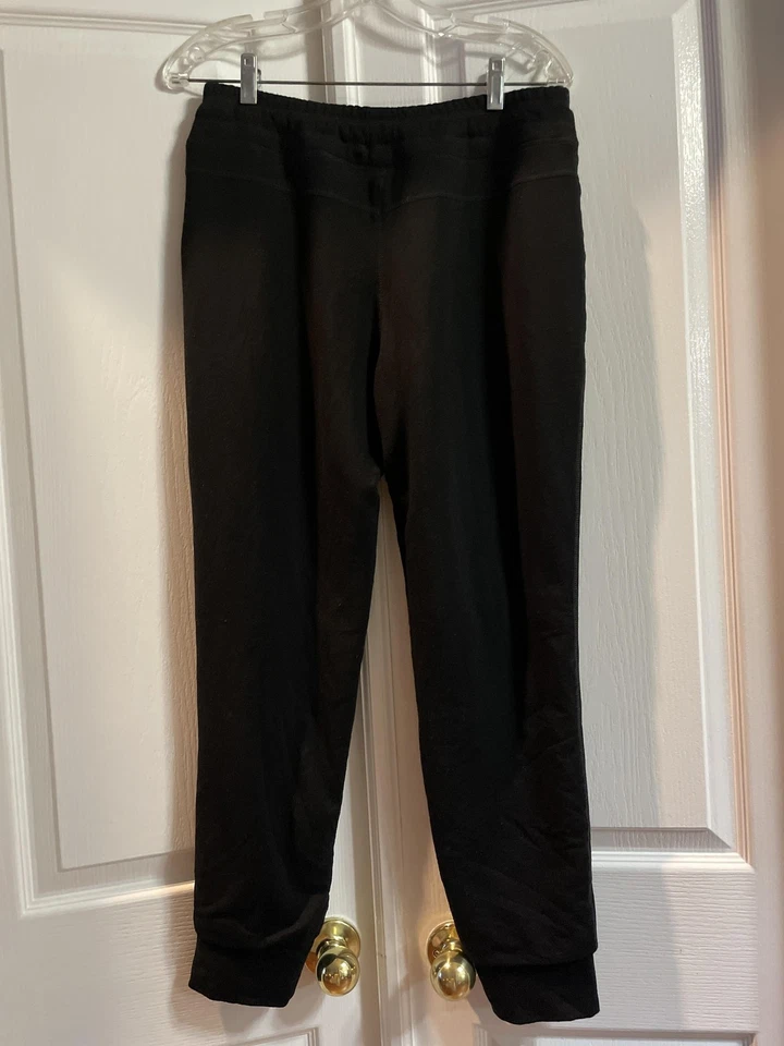 Pantalones de chándal Free Country para mujer pequeños negros forrados de sherpa polar con cordón con puños Foto 2 de 4