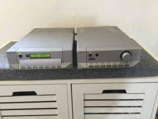 Cyrus CD6 and Cyrus 7 Amp in Quartz Silver. Excellent Condition. Remote and box.
