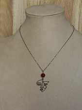 Collier argenté visage