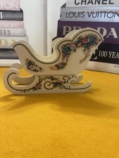 Vintage Wood Tabletop Santa Sleigh With A Multicolor Floral Design