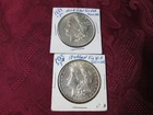TWO (2) MORGAN SILVER DOLLARS (1) 1885P AND (1) 1889P NEAR UNC. CONDITION