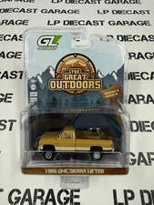 GREENLIGHT 1986 GMC Sierra Yellow w/ Tent 1:64 Diecast Great Outdoors