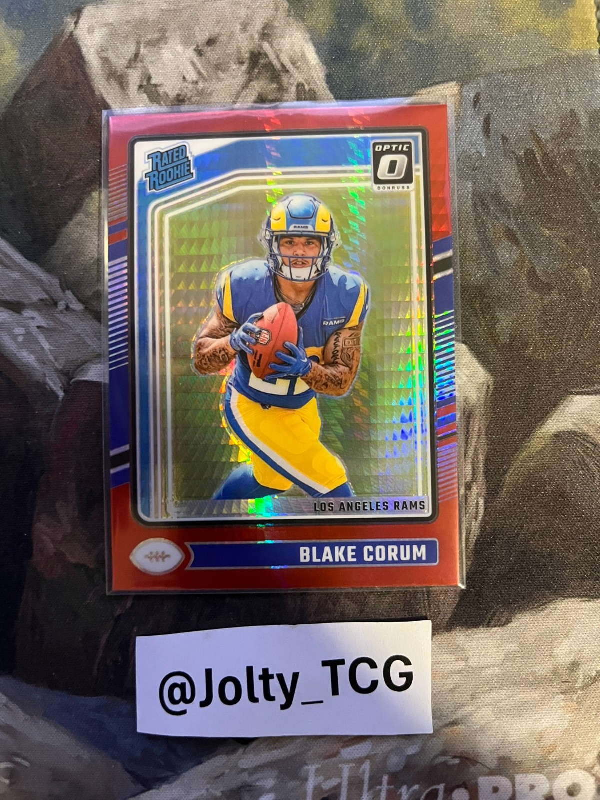 2024 Panini Donruss Optic - Rated Rookie Blake Corum #208 Red Hyper Prizm (RC)