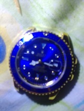 rolex submariner watch (blue and gold) used condition, is missing wrist band.