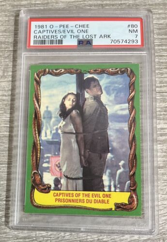 1981 OPC RAIDERS OF THE LOST ARK #80 CAPTIVES OF THE EVIL ONE PSA NM 7 G12 - Photo 1 sur 2