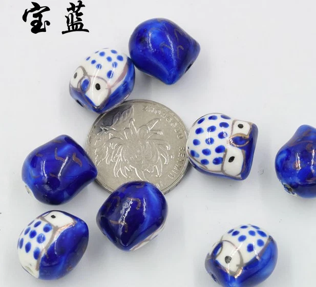 Venta al por mayor 100 cuentas de cerámica de búho color 14x16 mm artesanías Foto 4 de 4