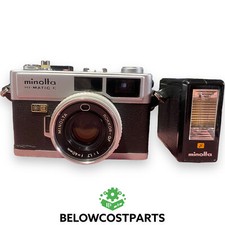 Minolta Hi-Matic E 40mm SLR Film Camera With Rokkor-QF Lens Sold As IS