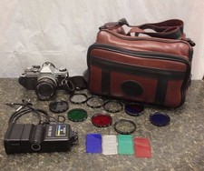 CANON FILM CAMERA AE-1 W/ LOTS OF 9 FILTER LENS  CARRY BAG 107824-1 NO BB-2