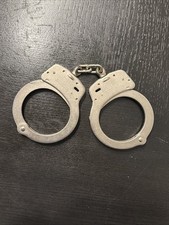 VINTAGE ESTATE AUTHENTIC SMITH  WESSON HANDCUFFS MODEL 100