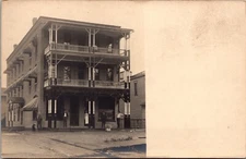 RPPC Three Story Brick Building Bradley House Genesee Street in Cuba, New York