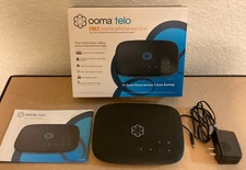 Ooma Telo VOIP phone base & power adapter, black
