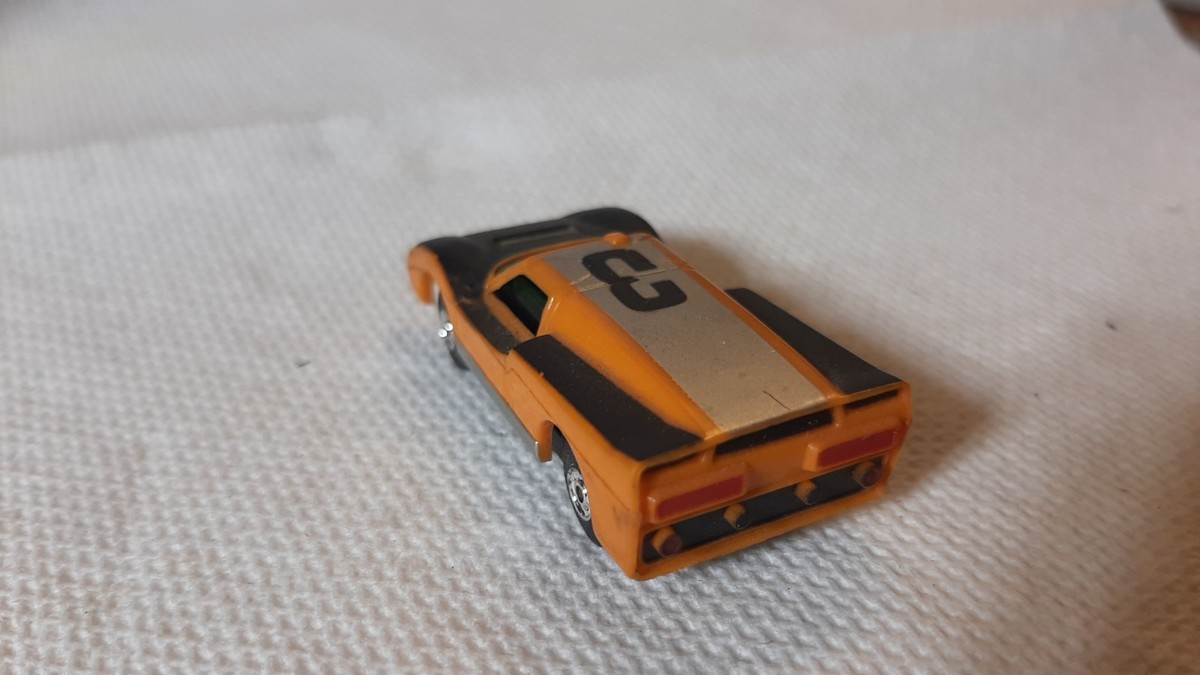 Aurora T-Jet FORD J-CAR HO Slot Car - Vintage original in orange