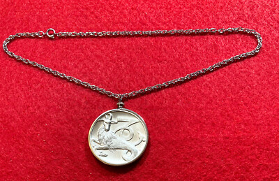 1974 CAPRICORN MEDALLION SILVER TONE WITH CHAIN ASTRO MINT 1974
