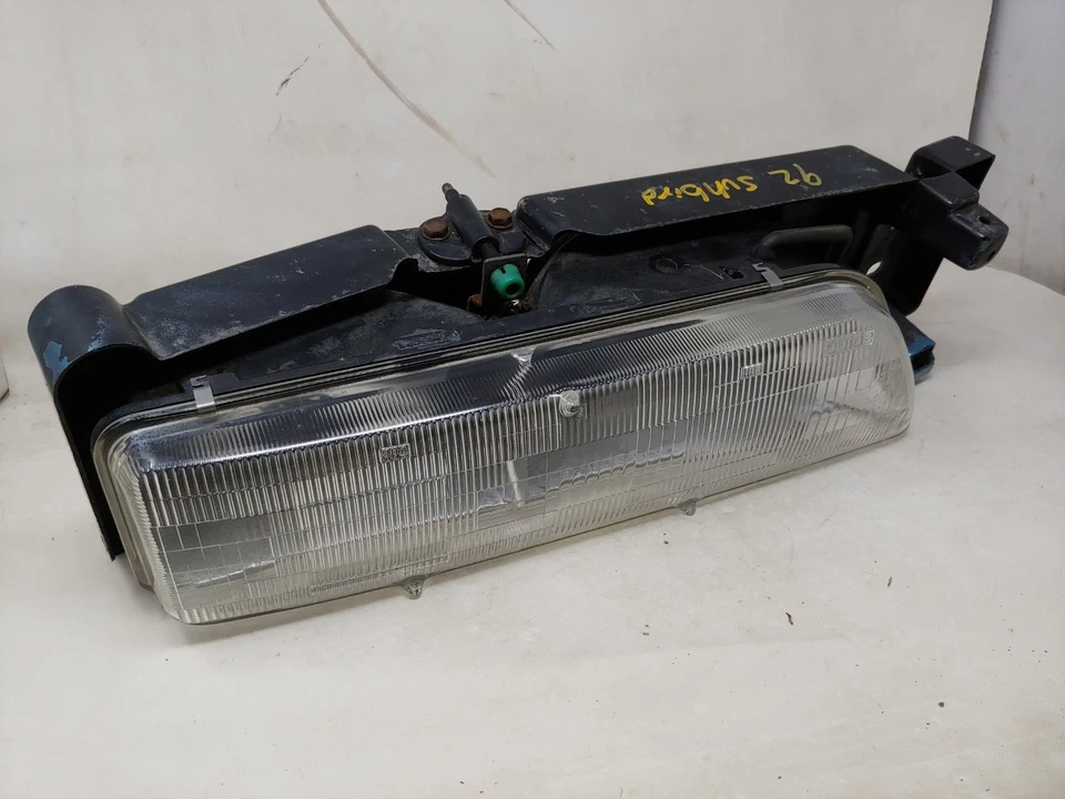 Pontiac Sunbird GM 1989 90 91 1992 OEM MONTAJE DE FAROS LATERALES DERECHO PASAJERO Foto 2 de 4