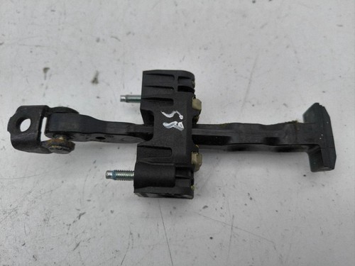 Door check strap stopper