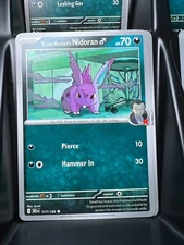 Team Rocket's Nidoran M 117/182 Sv10: Destined Rivals Regular