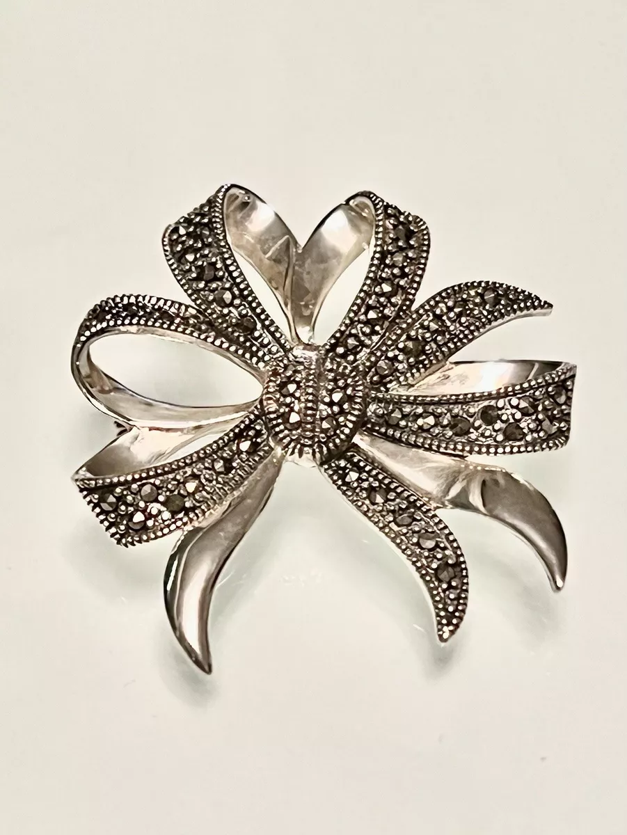 Designer brooch sale pins