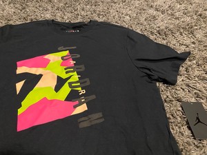 black and volt green shirt