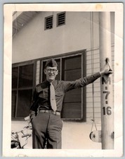 Vtg B W Snapshot Handsome Smiling Soldier in Military Uniform By Pole 1940s