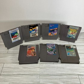 Nintendo NES Game Lot - 7 Games Rad Racer Sports Q-Bert Xevious & More - Working