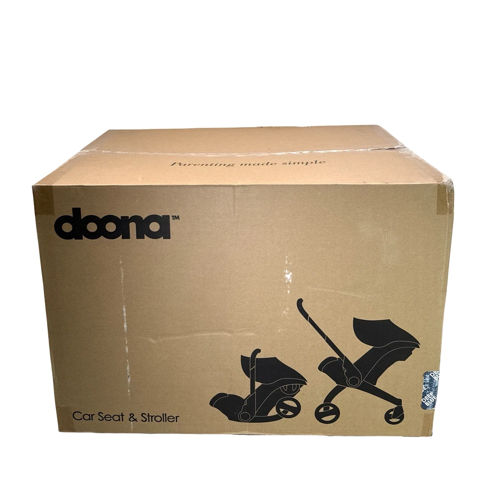 Asiento de coche y cochecito Doona, azul profundo - sistema de viaje todo en uno Foto 2 de 4