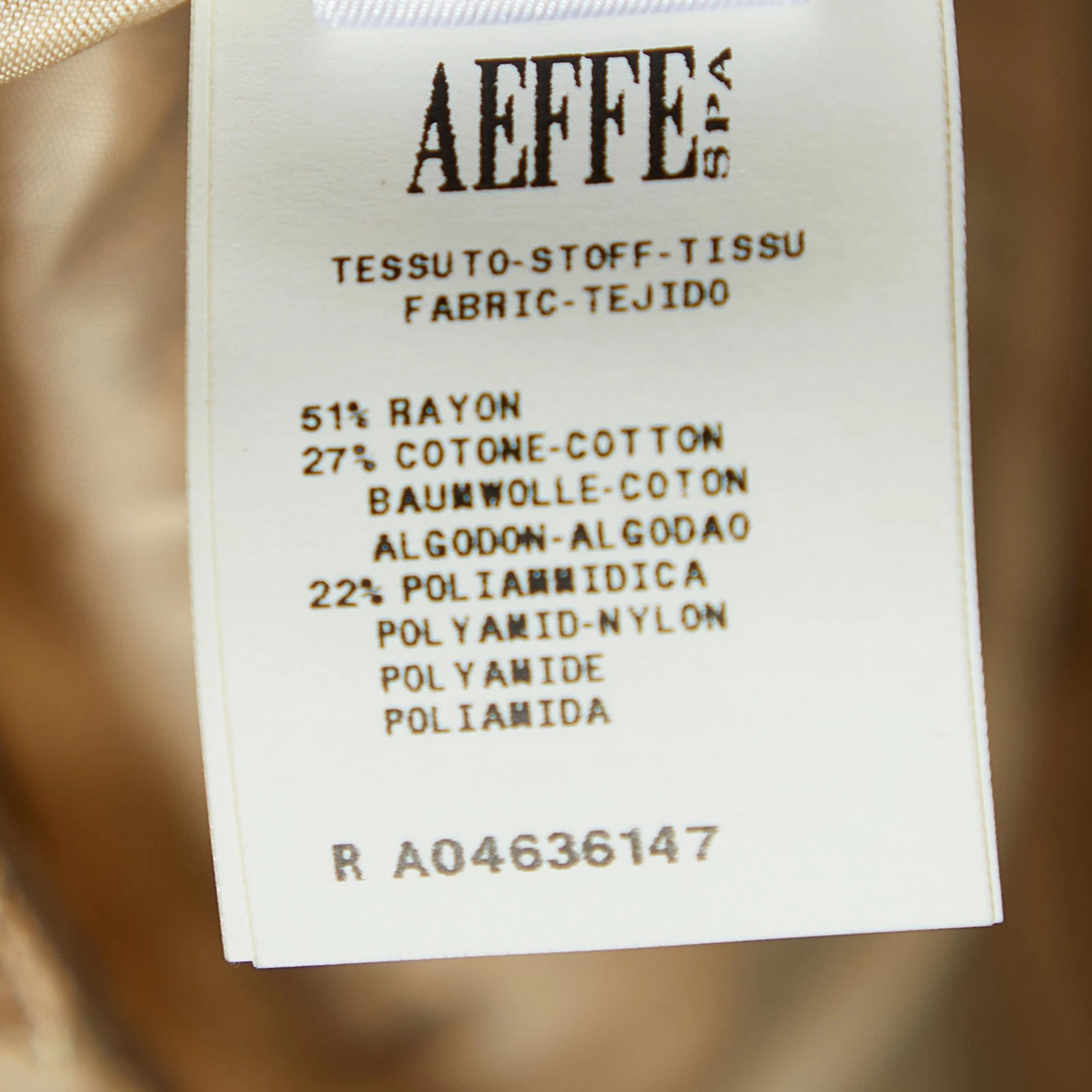 Abito Midi Moschino senza maniche beige economico e chic vernice dettaglio fiocco L