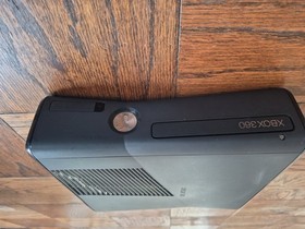 Xbox 360with Black Console Controller And Plugs