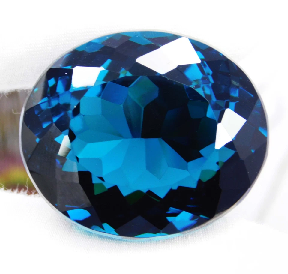 Piedra preciosa de corte ovalado granate tsavorita azul natural Kenia 128,90 quilates certificada Foto 3 de 4