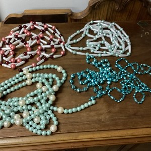 4 Different Strands Of Plastic Garland For Christmas Or Other Decorating 
