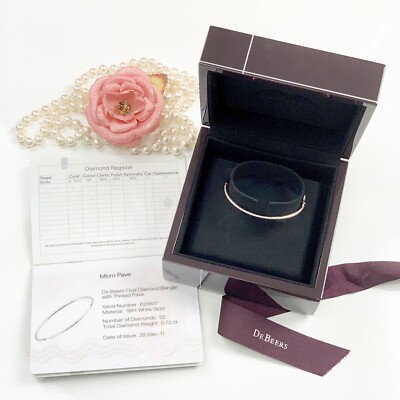 De Beers Oval Diamond Bangle with Thread Pave 0.72 ct 18Kt White Gold
