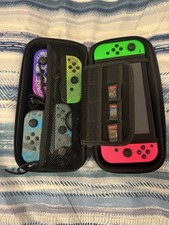 Nintendo Switch; 6 Joycons; 3 Games; Case