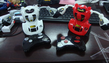 SHARPER IMAGE Remote Control Robot Multiplayer Combat Set,Red WhiteUntested-DG