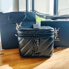 Sac cosmétique YVES SAINT LAURENT pochette cuir logo noir authentique limité