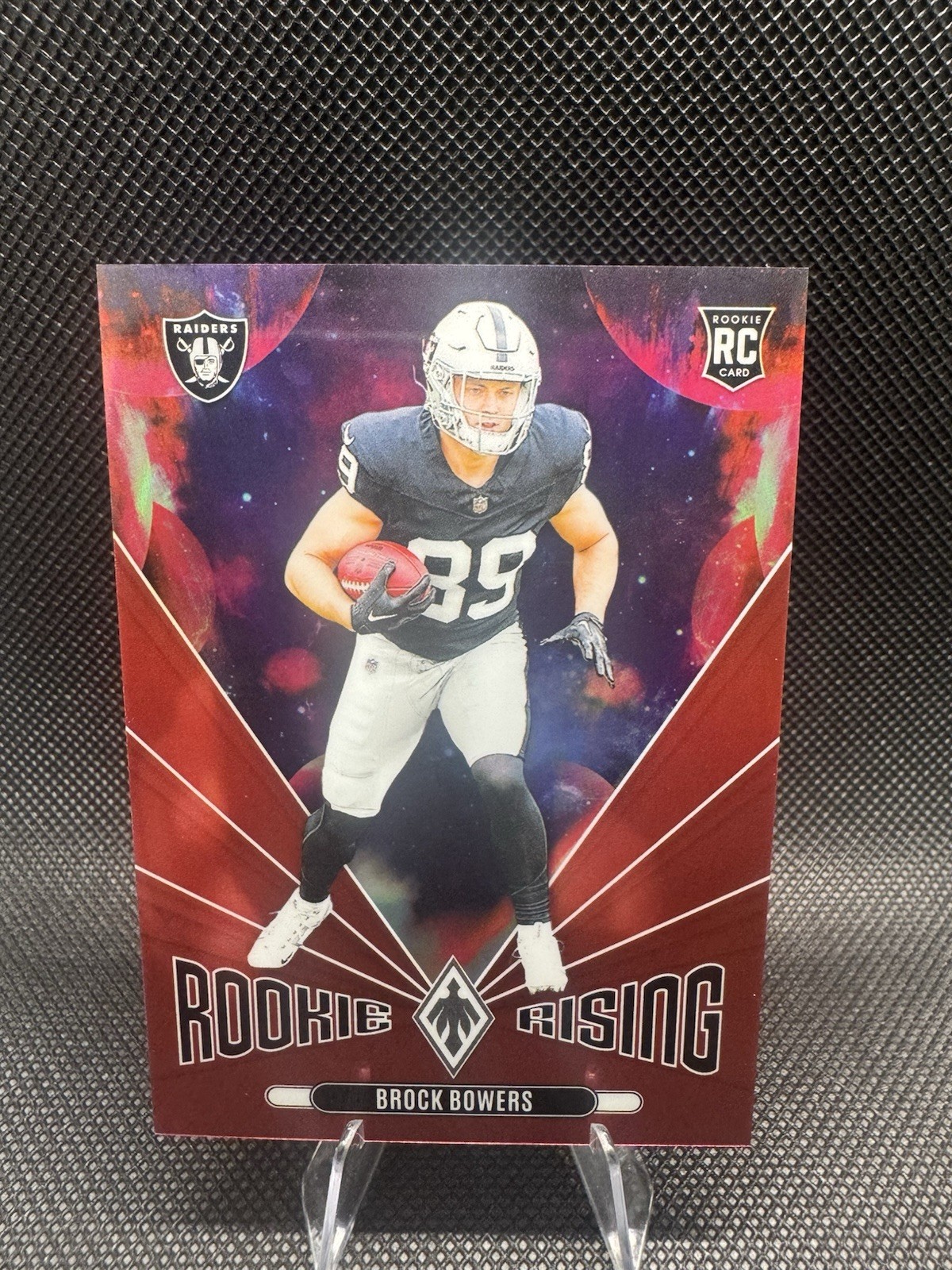 2024 Phoenix Brock Bowers Rookie Rising Red /99 RC Raiders