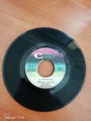 vinili 7'' 45 giri 290 adriano celentano un bimbo e un leone -canzone