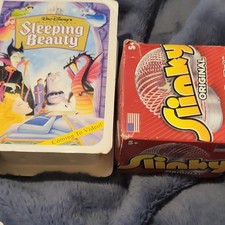 Slinky Original Walking Spring Toy in Box with sleeping beauty toy