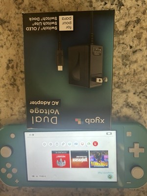 Nintendo Switch Lite Turquoise Handheld Console with Headphone Jack