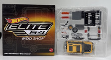 Hot Wheels Elite 64 Mod Shop '94 LAND ROVER DISCOVERY Yellow 1:64 Diecast HNJ65