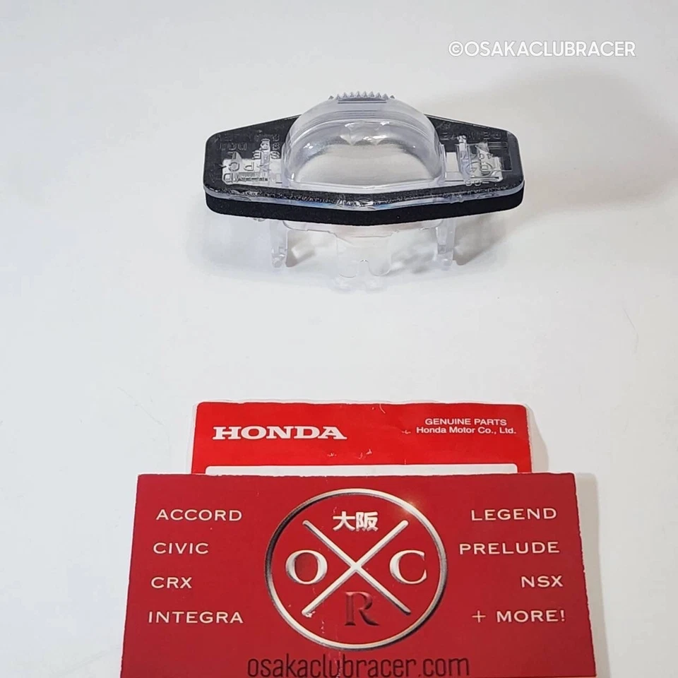 Luz de matrícula trasera genuina OEM Honda lente 03-08 Pilot 98-02 Accord S84 NUEVO Foto 2 de 4