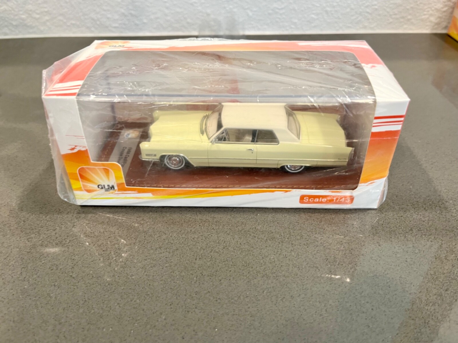 1966 CADILLAC COUPE De-VILLIE in CAF’E IVORY & WHITE TOP by GLM MODELS 1/43