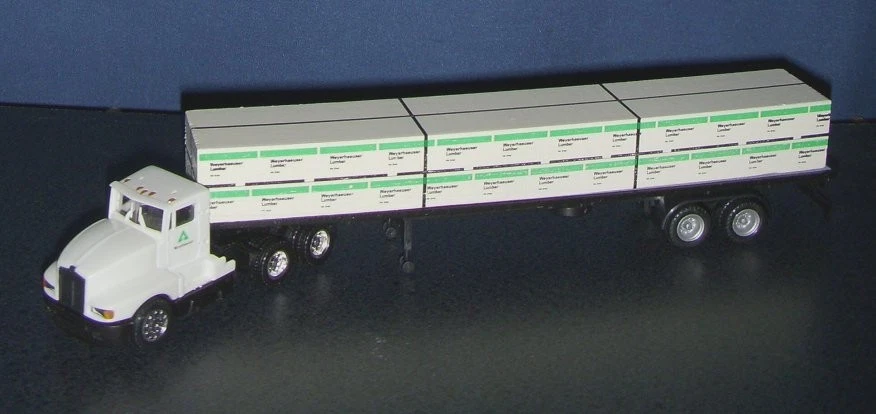 Remolque tractor Herpa 6127 escala HO Weyerhaeuser Kenworth Foto 3 de 4