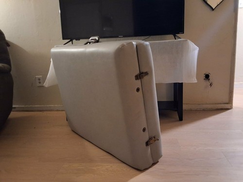 Massage table, gray, folding up