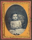 POSTMORTEM DAGUERREOTYPE OF CHILD HOLDING TINTED FLOWERS — photo 3