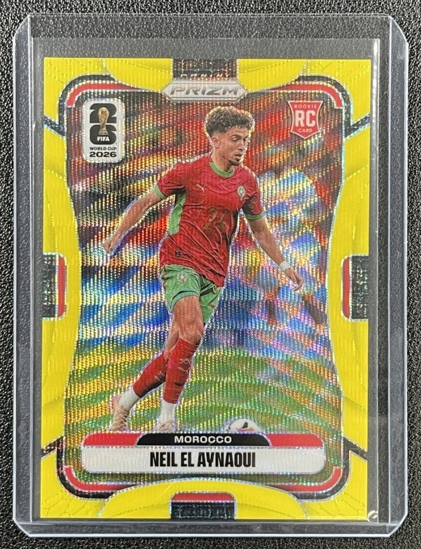 NEIL EL AYNAOUI 2026 PANINI PRIZM WORLD CUP #300 FLUORESCENT YELLOW WAVE RC /180