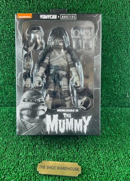 NECA TEENAGE MUTANT NINJA TURTLES X MONSTERS MICHELANGELO AS THE