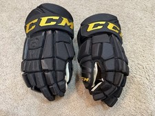 Vancouver Canucks Retro Skate Alternate Jersey Pro Stock CCM Hockey Gloves Vancouver Canucks Retro Skate Alternate Jersey Pro Stock CCM Hockey Gloves - Image 1