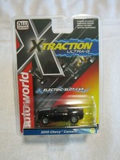 AUTO WORLD X-TRACTION 2010 CHEVY CAMARO HO SCALE SLOT CAR IN BLACK