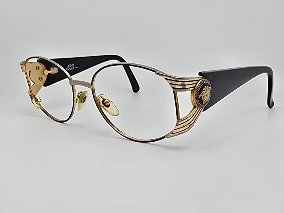 Gafas de sol Versace Mod S64 Col 16L doradas negras marco Italia 55-19-125 Foto 3 de 4