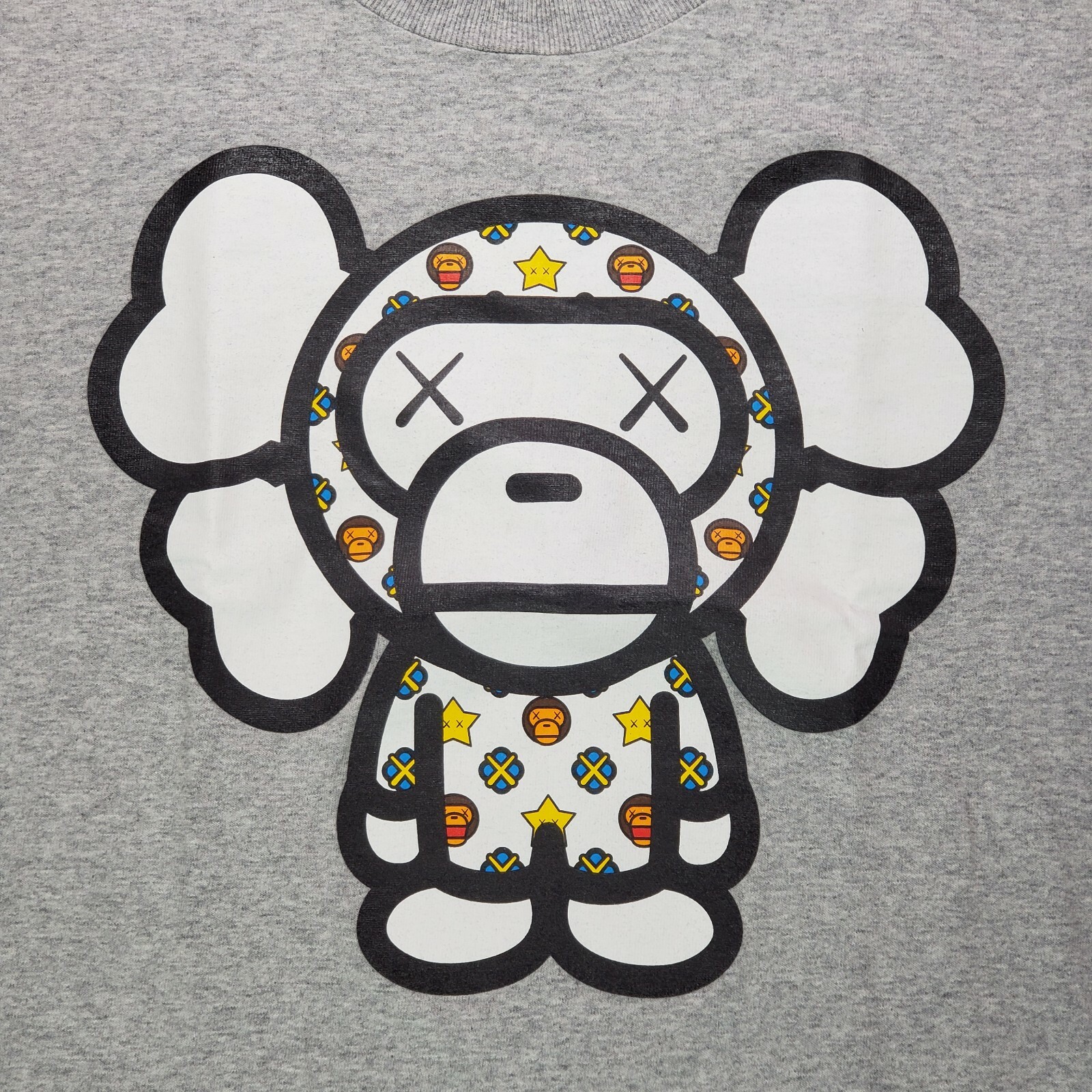 bape kaws logo